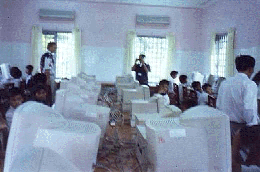 Photo: Donating computers for orphanage in Cambodia.